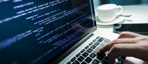 Programmer working computer code